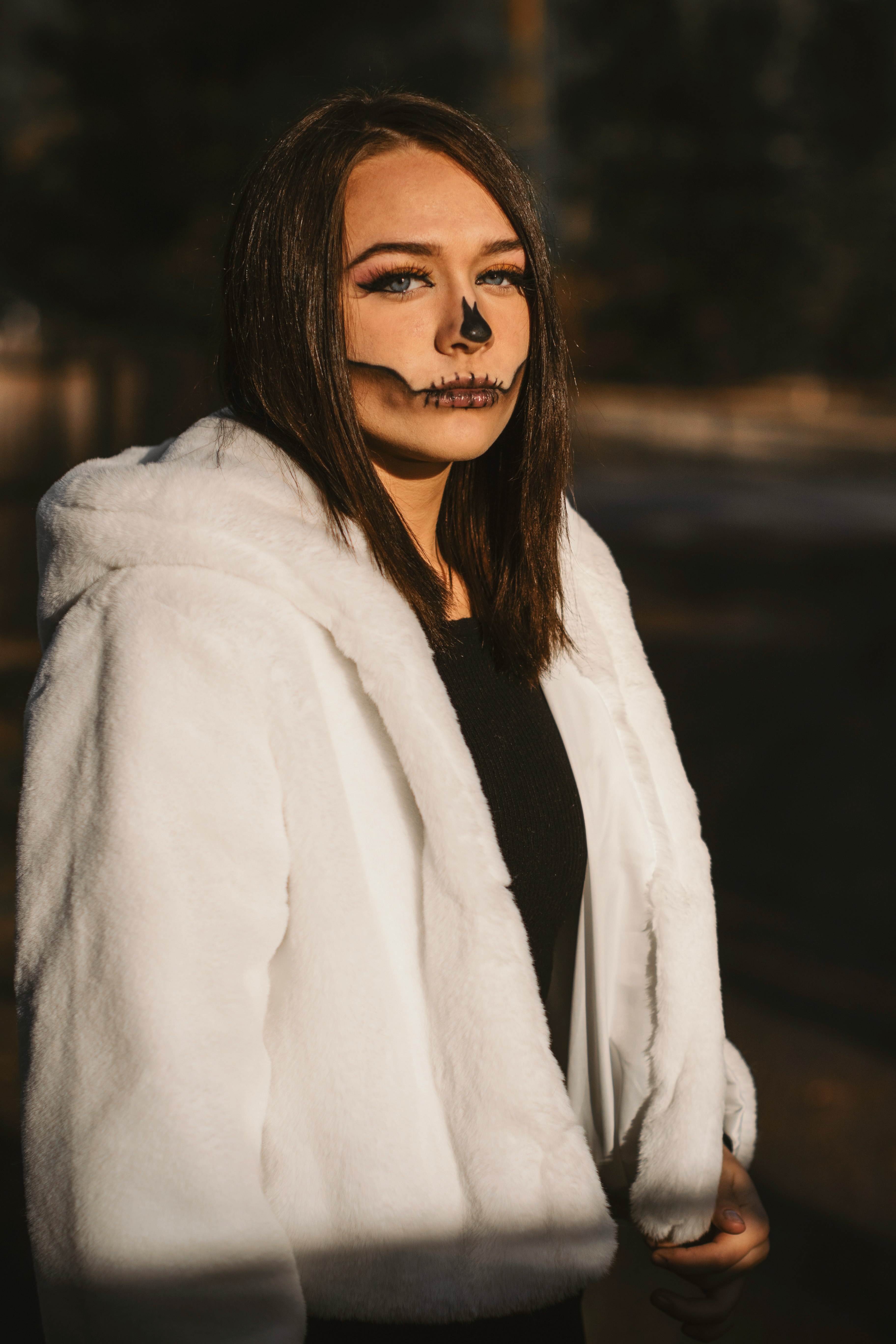 woman in white fur coat